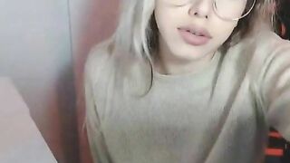 Petite Blonde with Glasses fingering her pussy