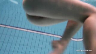 Hungarian babe Dona enjoys being naked in the pool